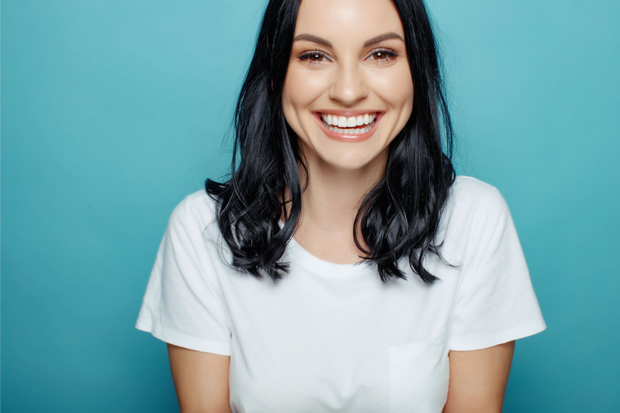 adult smiling with visible teeth in close up